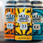 Latas de Mad Charlie's Blonde Ale, West Coast IPA y American Amber, cerveza hecha en Valdivia